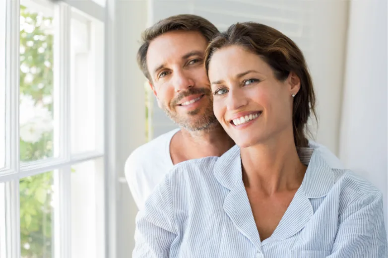 Couple by a window
